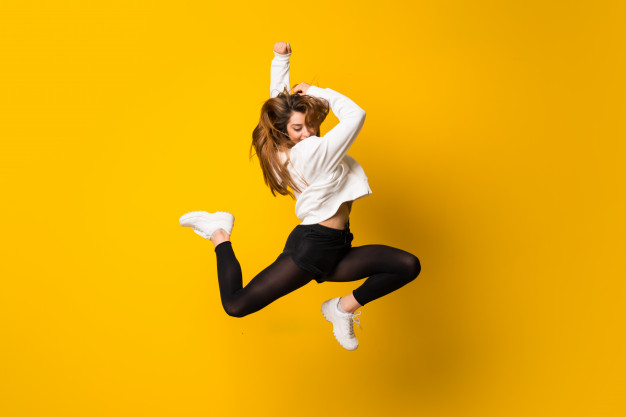 young-woman-jumping-isolated-yellow-wall_1368-43838.jpg